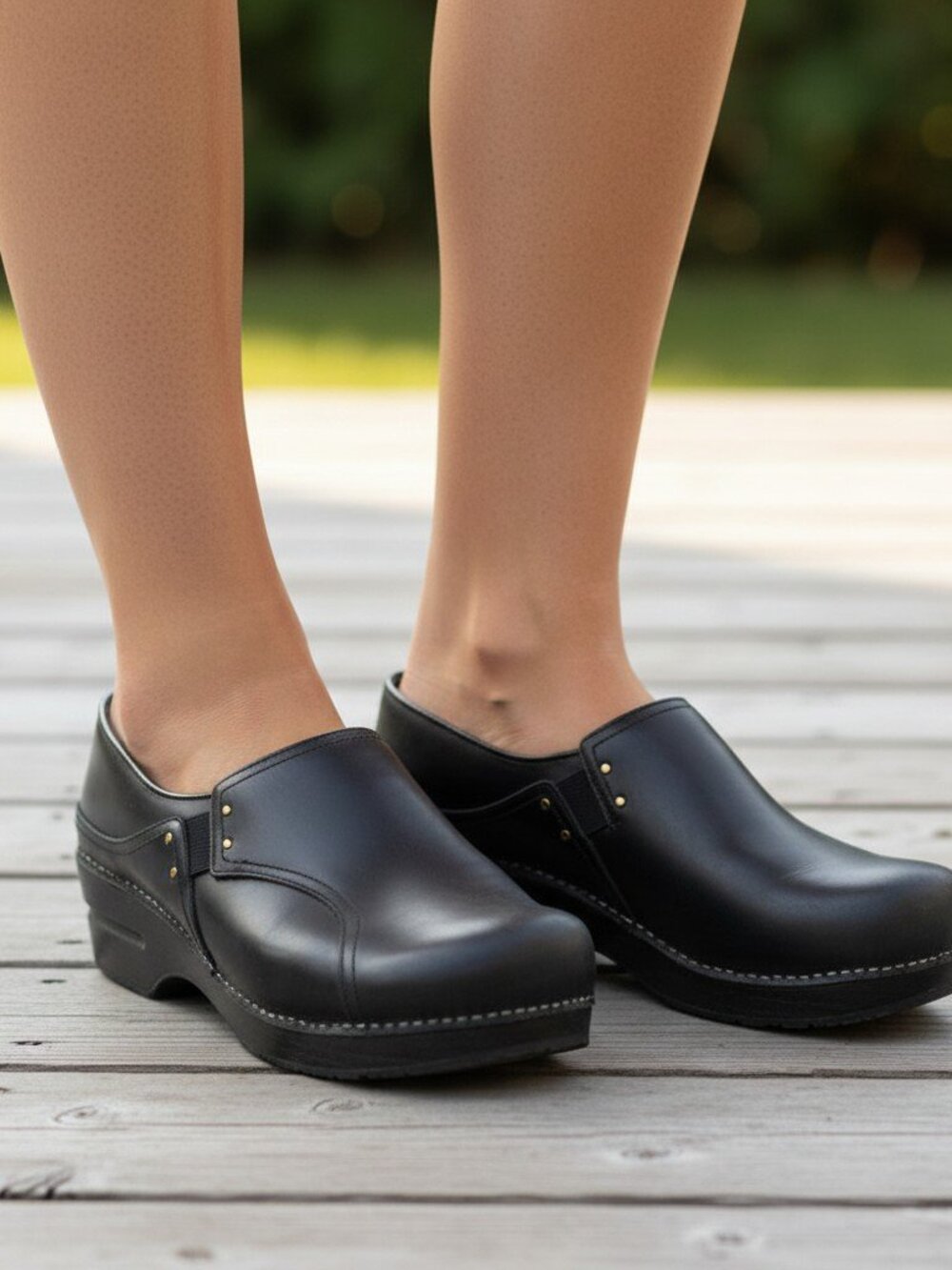 Dansko "Phoebe" Black Elastic Pull-on Leather Professional Clogs